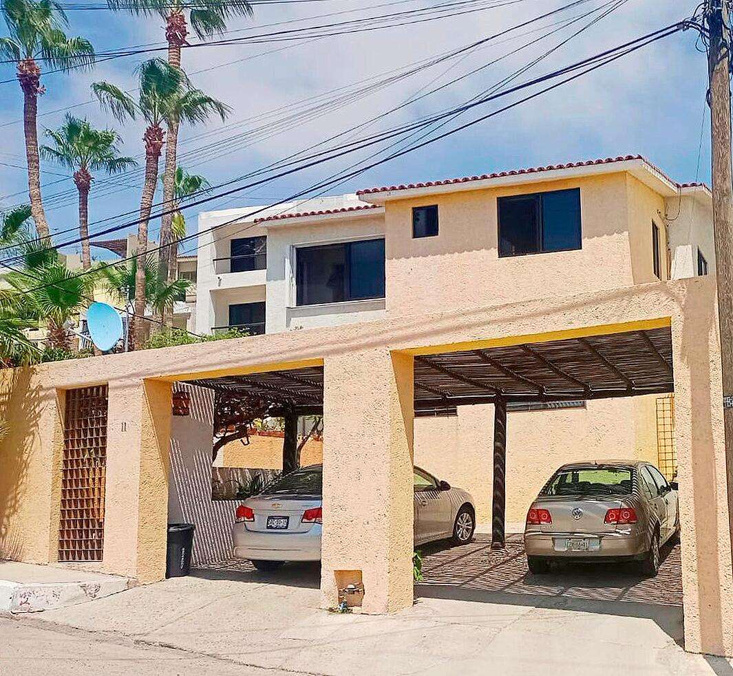 Los Cabos Chamizal Live or invest smart in this versatile 3-bedroom, 3-bath property in San José del Cabo. Featuring two fully independent units: a 1-bedroom studio with full kitchen, private bath, laundry area, and separate entrance; and a spacious 2-bedroom, 2-bath unit with its own kitchen, laundry room, and entrance. Both are fully furnished and equipped with air conditioning. Ideal to live in one and rent the other short or long term. Located in a safe, desirable neighborhood loved by locals and expats. Just minutes from the beach, shops, and restaurants — with a rooftop terrace offering stunning ocean for sale