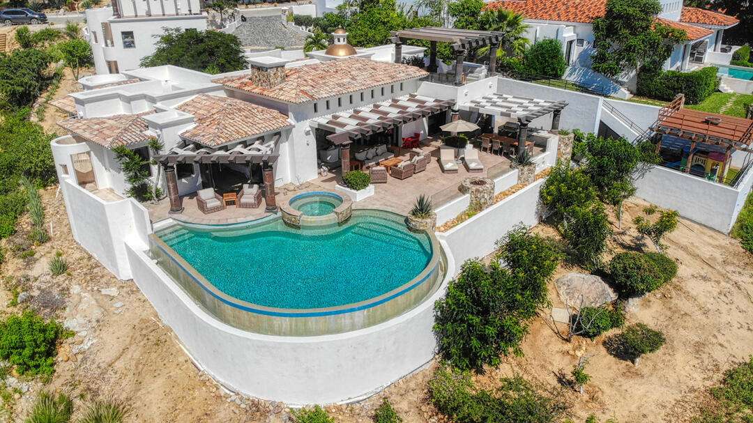 Los Cabos Palmilla Estates Discover a standout investment opportunity in coveted Palmilla Estates, where relaxed coastal style meets refined comfort. This single-story 3-bedroom, 3-bath home blends natural stone, warm wood beams, and a gourmet kitchen with high-end appliances, breakfast nook, and full bar. A generous entry courtyard opens to a heated pool, jacuzzi, outdoor kitchen, and a sun-washed yard overlooking the 9th fairway of the Jack Nicklaus Mountain Course. Eligible for a golf membership, it also makes an effortless vacation retreat with close access to Palmilla Beach, world-class amenities, and the charming San José town center. for sale