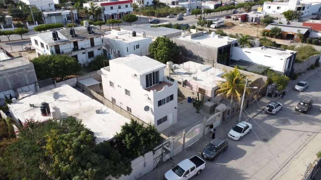 Los Cabos Santa Rosa Strategic Investment in El Zacatal: Dual-Unit Property with High ROI PotentialLocated just one block from the main Blvd. Dr. Ernesto Chánez Chávez, this property is a prime opportunity in one of San José del Cabo's high-demand rental markets. The building features two independent, spacious units designed for modern living.Unit A (2 Bedrooms): A generous layout ideal for small families or professionals. It features a full kitchen with a functional breakfast bar and a complete bathroom.Unit B (1 Bedroom): A cozy, efficient unit perfect for couples or individuals. Includes a kitchen with a built-in bar and a full bathroom. – 4320 C. Luis Castro Arballo, San Jose del Cabo, BS