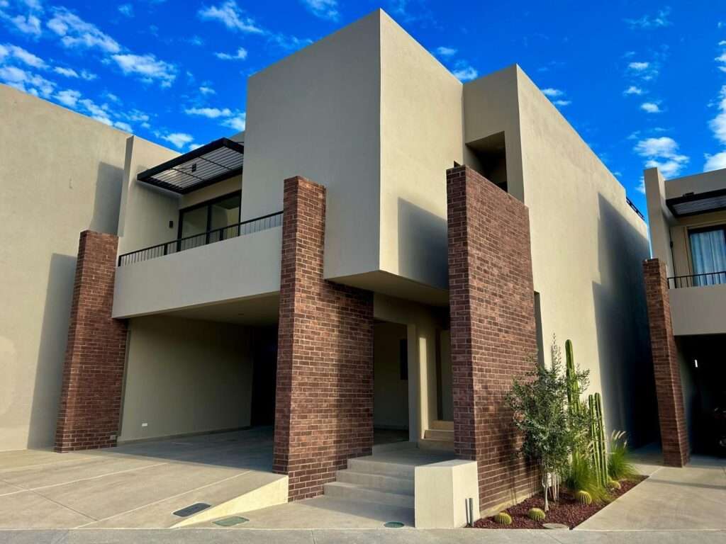 Los Cabos Brisas Del Pac East Rare opportunity to own a large Cabo property in a prime location close to the highway, shopping, hospitals, and schools. This unique compound offers multiple buildings with room for expansion and incredible rental income potential.The main home is an authentic Cabo-tyle house at the center of the property. A separate casita can easily be converted into two condos, ideal for generating rental income. The property also includes a large garage and workshop, with a flat buildable pad above the garage--perfect for another home or condos with stunning for sale