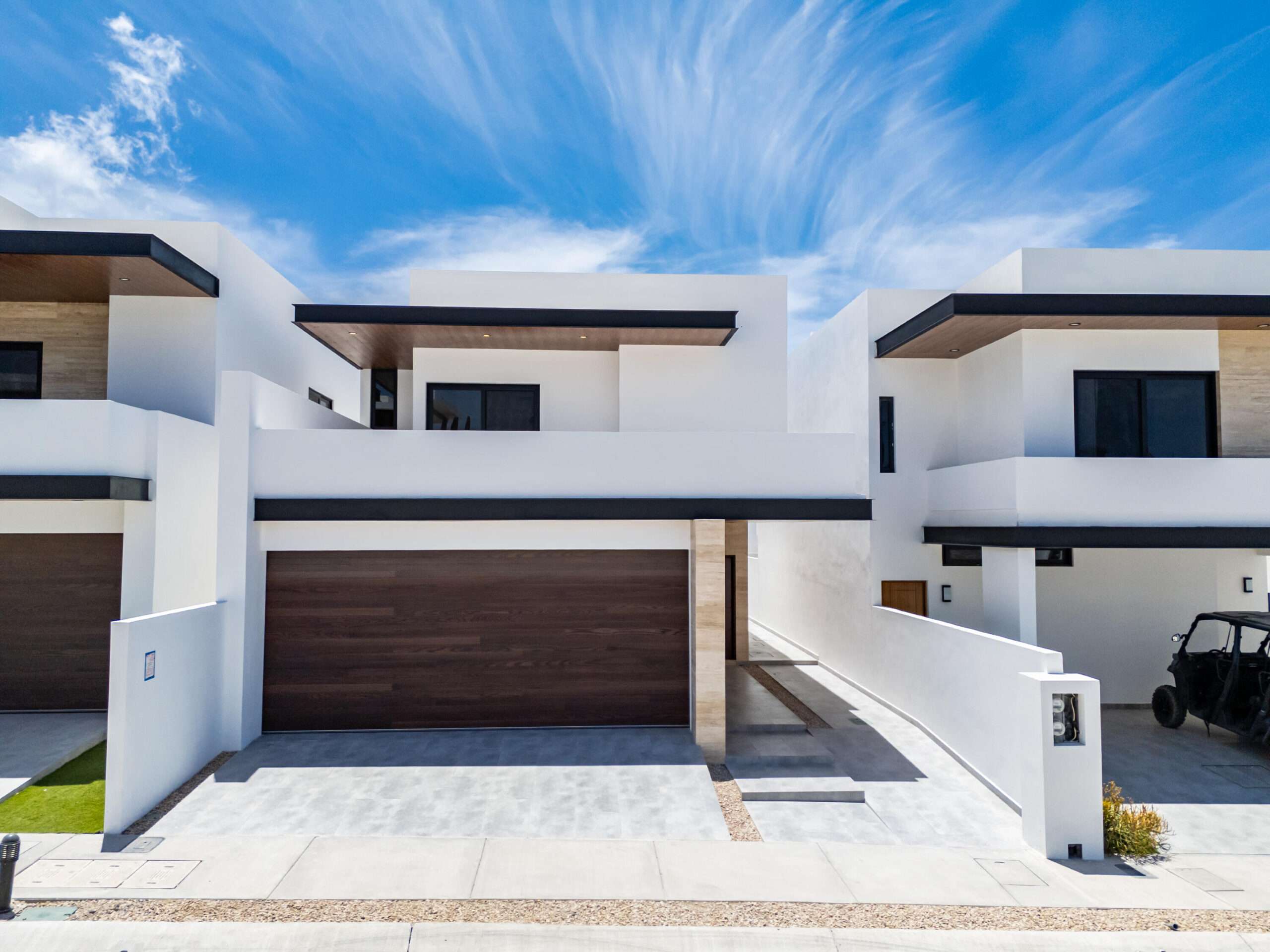 Los Cabos Brisas Del Pac East Rare opportunity to own a large Cabo property in a prime location close to the highway, shopping, hospitals, and schools. This unique compound offers multiple buildings with room for expansion and incredible rental income potential.The main home is an authentic Cabo-tyle house at the center of the property. A separate casita can easily be converted into two condos, ideal for generating rental income. The property also includes a large garage and workshop, with a flat buildable pad above the garage--perfect for another home or condos with stunning for sale